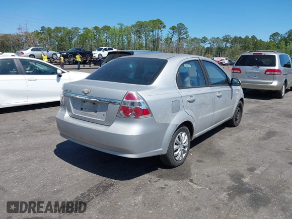 2007 Chevrolet Aveo LS with VIN KL1TD56617B098732, listed as a IAAI auction lot 41889243 with 115,426 mi miles and . Bid and sale history available at DreamBid. Image 4.