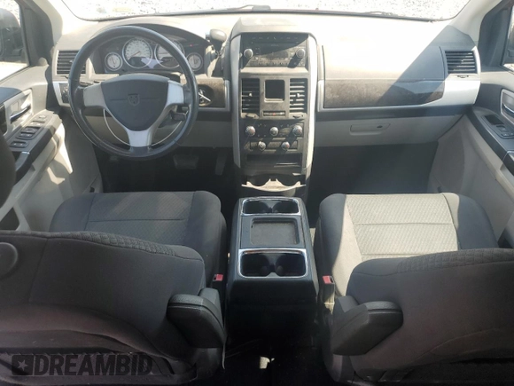 2010 Dodge Grand Caravan SXT with VIN 2D4RN5D1XAR389037, listed as a Copart auction lot 53931905 with 169,794 mi miles and Salvage Title. Bid and sale history available at DreamBid. Image 8.