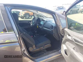 2018 Honda Fit LX with VIN 3HGGK5H51JM731851, listed as a IAAI auction lot 42570144 with 69,236 mi miles and . Bid and sale history available at DreamBid. Image 5.