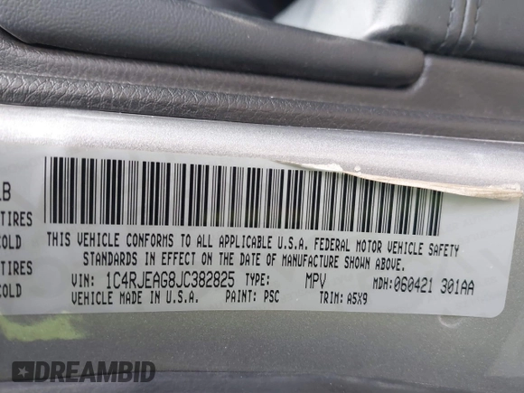 2018 Jeep Grand Cherokee Laredo E with VIN 1C4RJEAG8JC382825, listed as a IAAI auction lot 41288056 with 105,652 mi miles. Bid and sale history available at carsss.com. Image 9.