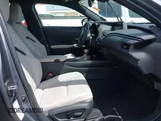 2021 Lexus UX 250h with VIN JTHP9JBH1M2040593, listed as a IAAI auction lot 42024493 with 33,394 mi miles and . Bid and sale history available at DreamBid. Image 5.