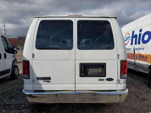 2011 Ford Econoline Passenger XL with VIN 1FBNE3BLXBDA75840, listed as a Copart auction lot 72030614 with 57,183 mi miles and Salvage Title. Bid and sale history available at DreamBid. Image 6.