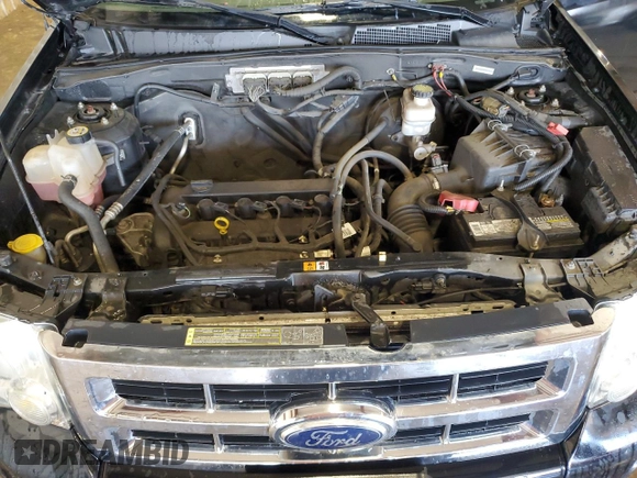 2012 Ford Escape XLT with VIN 1FMCU9D71CKC27621, listed as a Copart auction lot 62741115 with 128,254 mi miles and Salvage title. Bid and sale history available at DreamBid. Image 12.