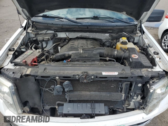2014 Ford F-150 XL with VIN 1FTFX1ET0EKD17173, listed as a Copart auction lot 59056345 with 185,804 mi miles and Salvage title. Bid and sale history available at DreamBid. Image 11.
