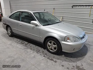 2000 Honda Civic EX with VIN 1HGEJ8142YL112989, listed as a IAAI auction lot 41469210 with 117,154 mi miles. Bid and sale history available at carsss.com. Image 1.