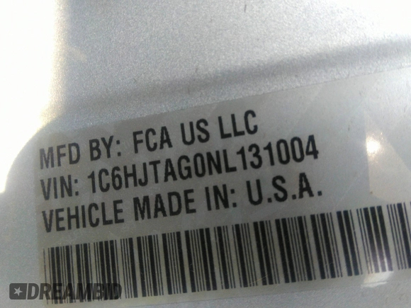 2022 Jeep Gladiator Willys with VIN 1C6HJTAG0NL131004, listed as a IAAI auction lot 40307060 with Not provided miles and . Bid and sale history available at DreamBid. Image 9.