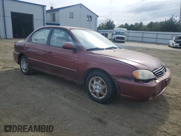 2003 Kia Spectra with VIN KNAFB121935241589, listed as a Copart auction lot 71933194 with 61,738 mi miles and Salvage Title. Bid and sale history available at DreamBid. Image 4.