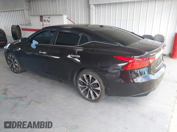 2016 Nissan Maxima SV with VIN 1N4AA6AP5GC413563, listed as a IAAI auction lot 42196144 with 209,711 mi miles and . Bid and sale history available at DreamBid. Image 3.