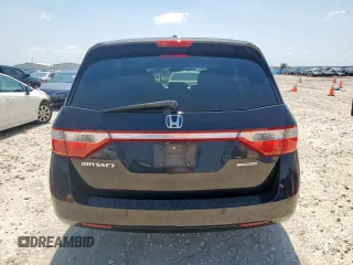 2011 Honda Odyssey Touring with VIN 5FNRL5H90BB033700, listed as a Copart auction lot 58602835 with 197,063 mi miles and Clean title. Bid and sale history available at DreamBid. Image 6.