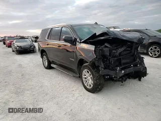 2021 Chevrolet Tahoe LS z VIN 1GNSCMKD5MR229435, wystawiony jako Copart lot #81240864 z przebiegiem 103 660 mil mil oraz Nie do naprawy • Non repairable. Historia ofert i sprzedaży dostępna na DreamBid. Obrazek 11.