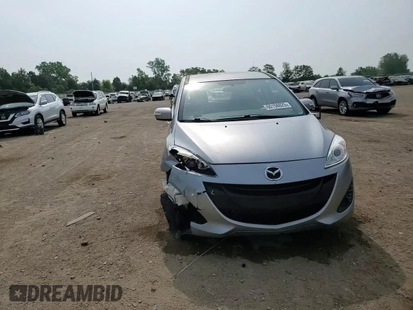 2015 Mazda 5 Sport with VIN JM1CW2BL4F0181336, listed as a Copart auction lot 60156025 with 72,079 mi miles and Salvage title. Bid and sale history available at DreamBid. Image 14.