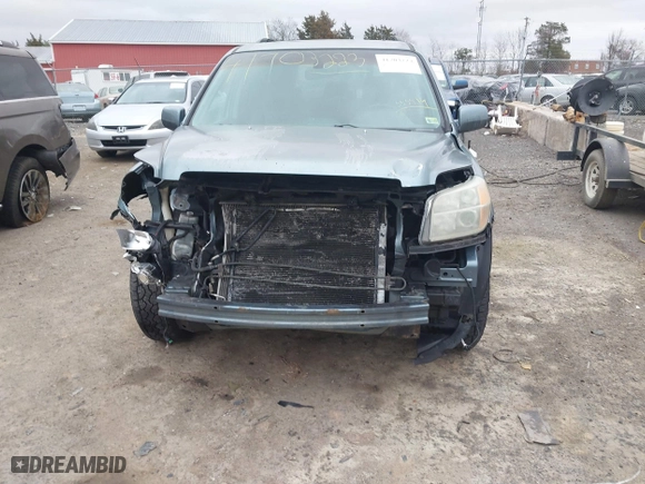 2006 Honda Pilot EX-L with RES with VIN 2HKYF18646H555514, listed as a IAAI auction lot 41703223 with 292,487 mi miles. Bid and sale history available at carsss.com. Image 6.