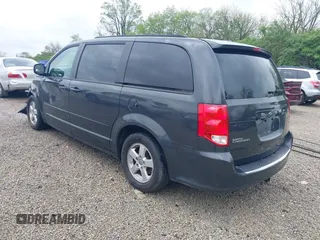 2012 Dodge Grand Caravan SXT with VIN 2C4RDGCG7CR236328, listed as a IAAI auction lot 42170991 with 72,831 mi miles and . Bid and sale history available at DreamBid. Image 3.