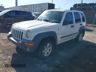 2004 Jeep Liberty Sport with VIN 1J4GL48K24W303510, listed as a IAAI auction lot 41660788 with 178,067 mi miles. Bid and sale history available at carsss.com. Image 17.