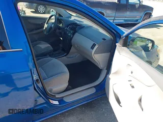 2009 Toyota Corolla with VIN JTDBL40E999021523, listed as a IAAI auction lot 42019856 with 194,011 mi miles. Bid and sale history available at carsss.com. Image 5.