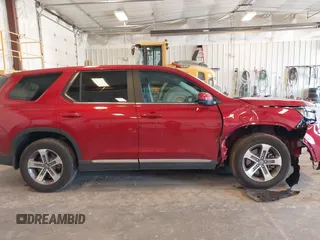 2023 Honda Pilot EX-L z VIN 5FNYG1H50PB019244, wystawiony jako IAAI lot #42091449 z przebiegiem 11 857 mil mil oraz . Historia ofert i sprzedaży dostępna na DreamBid. Obrazek 13.