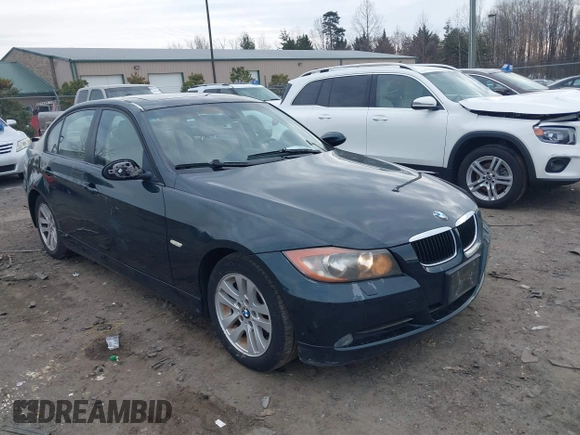 2006 BMW 3 Series 325xi with VIN WBAVD13516KT79513, listed as a IAAI auction lot 41609704 with 116,883 mi miles. Bid and sale history available at carsss.com. Image 1.
