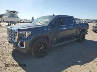 2019 GMC Sierra 1500 Denali with VIN 3GTU9FEDXKG277906, listed as a Copart auction lot 47025625 with 138,008 mi miles and Salvage title. Bid and sale history available at DreamBid. Image 1.