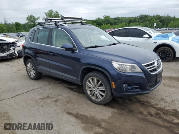 2011 Volkswagen Tiguan SEL z VIN WVGBV7AX2BW534482, wystawiony jako Copart lot #61097265 z przebiegiem 186 282 mil mil oraz Czysty tytuł • Clean title. Historia ofert i sprzedaży dostępna na DreamBid. Obrazek 4.