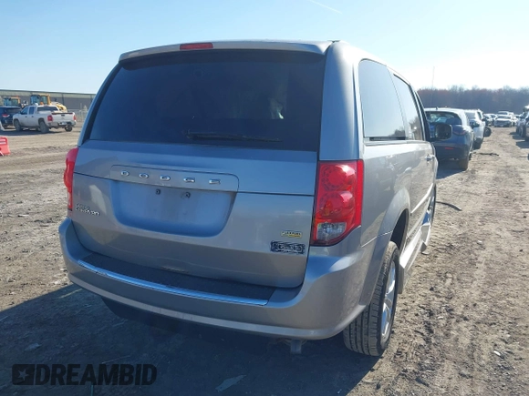2014 Dodge Grand Caravan SXT 30th Anniversary with VIN 2C4RDGCG3ER119994, listed as a IAAI auction lot 42062017 with 96,909 mi miles and . Bid and sale history available at DreamBid. Image 4.
