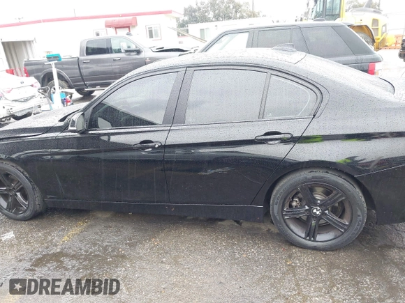 2015 BMW 3 Series 328i with VIN WBA3A5C59FF606236, listed as a IAAI auction lot 41690502 with 115,085 mi miles. Bid and sale history available at carsss.com. Image 14.