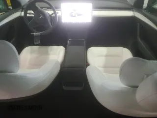 2023 Tesla Model Y Long Range z VIN 7SAYGDEE6PA179733, wystawiony jako Copart lot #58399015 z przebiegiem 45 780 mil mil oraz Szkoda całkowita • Salvage title. Historia ofert i sprzedaży dostępna na DreamBid. Obrazek 8.