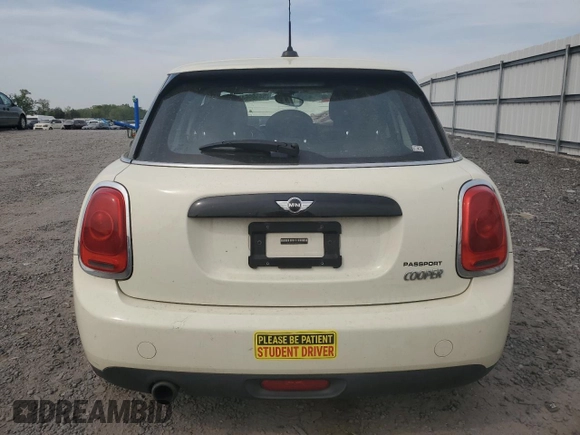 2017 MINI Hardtop 4 Door Cooper with VIN WMWXU1C56H2E17848, listed as a Copart auction lot 54599645 with 42,716 mi miles and Salvage Title. Bid and sale history available at DreamBid. Image 6.