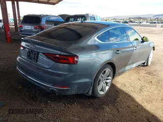2019 Audi A5 Sportback Premium with VIN WAUANCF51KA060972, listed as a IAAI auction lot 41783485 with 98,456 mi miles. Bid and sale history available at carsss.com. Image 4.