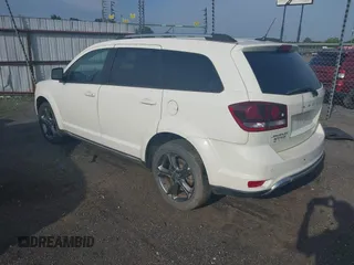 2015 Dodge Journey Crossroad with VIN 3C4PDCGG6FT588666, listed as a IAAI auction lot 42452044 with 238,566 mi miles and . Bid and sale history available at DreamBid. Image 3.