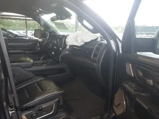 2020 Ram 1500 Limited with VIN 1C6SRFHT2LN147306, listed as a IAAI auction lot 42310509 with 74,087 mi miles and . Bid and sale history available at DreamBid. Image 5.