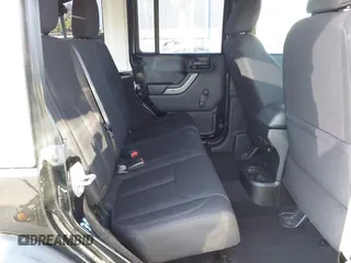 2018 Jeep Wrangler JK Unlimited Sport S with VIN 1C4BJWDG7JL818843, listed as a IAAI auction lot 41506058 with 43,563 mi miles. Bid and sale history available at carsss.com. Image 8.