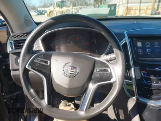 2015 Cadillac SRX with VIN 3GYFNAE35FS608595, listed as a IAAI auction lot 41282751 with 127,055 mi miles and . Bid and sale history available at DreamBid. Image 21.