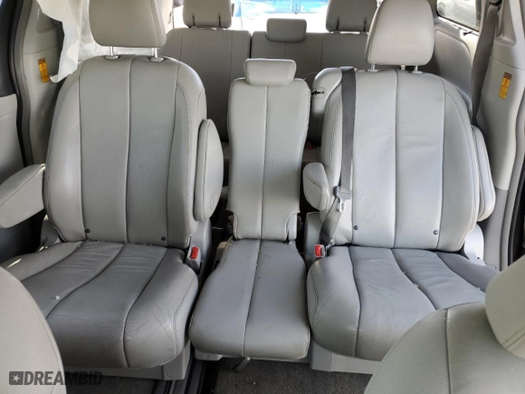 2014 Toyota Sienna XLE with VIN 5TDYK3DC8ES457727, listed as a Copart auction lot 77224224 with 121,879 mi miles and Salvage Title. Bid and sale history available at carsss.com. Image 10.