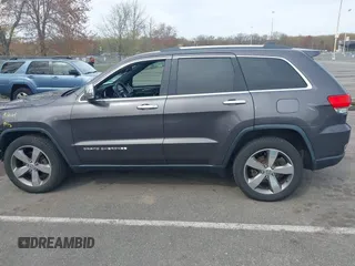 2016 Jeep Grand Cherokee Limited 75th Anniversary with VIN 1C4RJFBG5GC497766, listed as a IAAI auction lot 42048662 with 164,281 mi miles and . Bid and sale history available at DreamBid. Image 14.