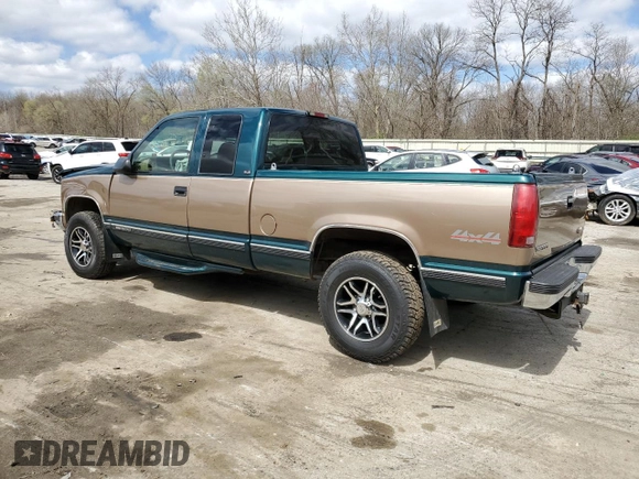 1995 GMC Sierra 1500 z VIN 2GTEK19K3S1511767, wystawiony jako Copart lot #51977295 z przebiegiem 215 667 mil mil oraz Szkody całkowita. Historia ofert i sprzedaży dostępna na DreamBid. Obrazek 2.