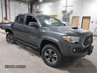 2018 Toyota Tacoma SR5 with VIN 3TMDZ5BN7JM051586, listed as a IAAI auction lot 42671287 with 93,042 mi miles and . Bid and sale history available at DreamBid. Image 1.