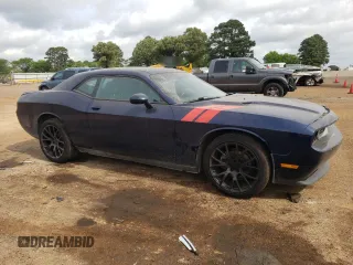 2013 Dodge Challenger SXT z VIN 2C3CDYAG3DH578949, wystawiony jako Copart lot #54664815 z przebiegiem 205 376 mil mil oraz Szkody całkowita. Historia ofert i sprzedaży dostępna na DreamBid. Obrazek 4.