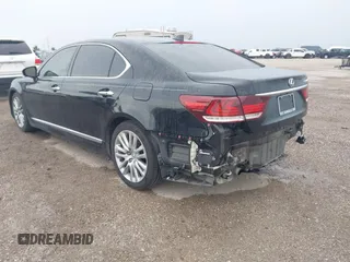 2015 Lexus LS 460 L with VIN JTHGL5EF6F5054364, listed as a IAAI auction lot 42465692 with 139,431 mi miles and . Bid and sale history available at DreamBid. Image 3.