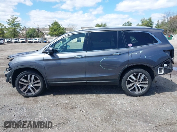2016 Honda Pilot Elite with VIN 5FNYF6H06GB058392, listed as a IAAI auction lot 41983804 with 103,304 mi miles. Bid and sale history available at carsss.com. Image 15.