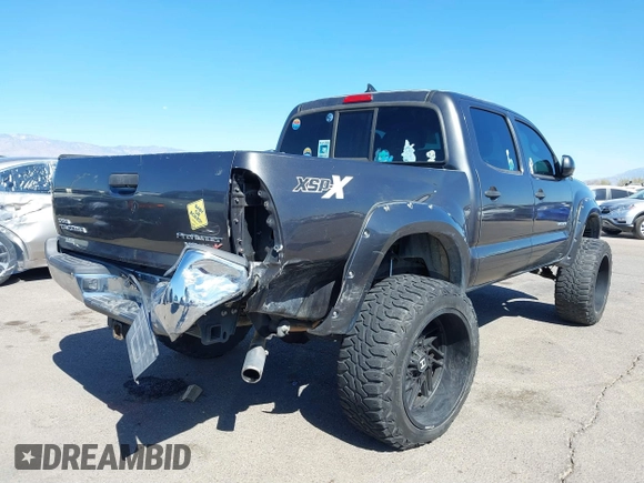 2014 Toyota Tacoma PreRunner with VIN 3TMJU4GN3EM165840, listed as a IAAI auction lot 41666871 with 150,333 mi miles and . Bid and sale history available at DreamBid. Image 6.