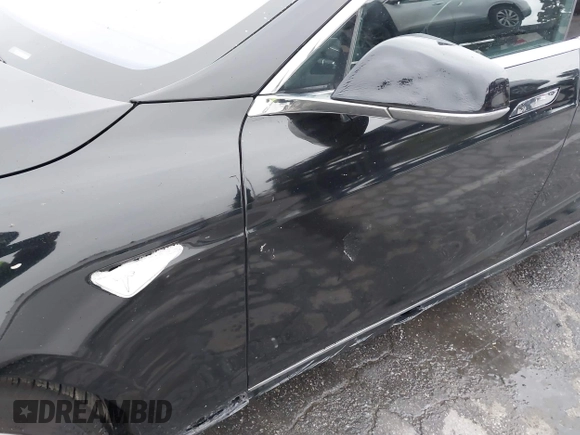 2016 Tesla Model S 70 with VIN 5YJSA1E1XGF154577, listed as a IAAI auction lot 41778697 with 62,630 mi miles and . Bid and sale history available at DreamBid. Image 12.