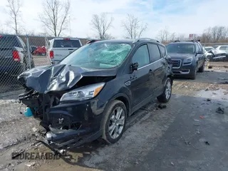 2014 Ford Escape Titanium with VIN 1FMCU9J9XEUC15464, listed as a IAAI auction lot 41524925 with 160,445 mi miles. Bid and sale history available at carsss.com. Image 17.
