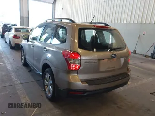 2015 Subaru Forester 2.5i with VIN JF2SJABC7FH808554, listed as a IAAI auction lot 42396879 with 54,850 mi miles and . Bid and sale history available at DreamBid. Image 3.