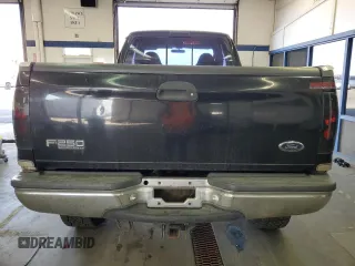 1999 Ford Super Duty F-250 XL with VIN 1FTNX21F0XEC99244, listed as a Copart auction lot 72545104 with 264,697 mi miles and Salvage Title. Bid and sale history available at carsss.com. Image 6.