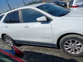 2021 Chevrolet Equinox LT with VIN 3GNAXKEV7MS132050, listed as a IAAI auction lot 41770065 with 116,921 mi miles and . Bid and sale history available at DreamBid. Image 13.