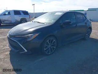 2019 Toyota Corolla Hatchback SE with VIN JTNK4RBE7K3057934, listed as a IAAI auction lot 41347395 with 76,949 mi miles. Bid and sale history available at carsss.com. Image 17.