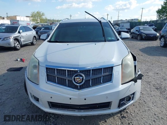 2011 Cadillac SRX Performance Collection z VIN 3GYFNBEYXBS543819, wystawiony jako IAAI lot #42159051 z przebiegiem Nie podano mil oraz . Historia ofert i sprzedaży dostępna na DreamBid. Obrazek 13.