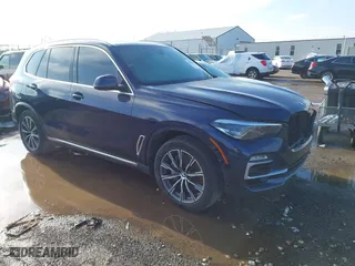 2019 BMW X5 xDrive50i with VIN 5UXJU2C50KLN67353, listed as a IAAI auction lot 41956458 with 113,194 mi miles. Bid and sale history available at carsss.com. Image 1.