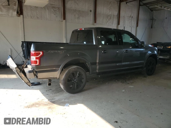 2020 Ford F-150 XL with VIN 1FTEW1E44LFC02735, listed as a Copart auction lot 62062125 with 111,471 mi miles and Salvage title. Bid and sale history available at DreamBid. Image 3.