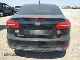 2018 Ford Focus SE z VIN 1FADP3FE0JL293485, wystawiony jako Copart lot #61202625 z przebiegiem 91 025 mil mil oraz Szkoda całkowita • Salvage title. Historia ofert i sprzedaży dostępna na DreamBid. Obrazek 6.